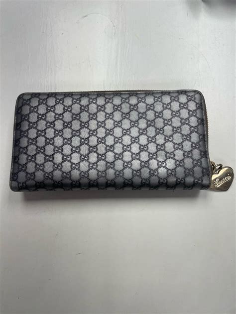 gucci embossed rubber bag|Gucci gg embossed wallet.